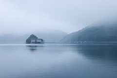Sea cottage in the fog
