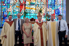 Newly ordained Deacon Luke Daghir and Fr. Ben Daghir pose with Bishop Persico, parents Joe and Robin, and brother Nick.
