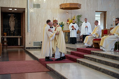 Newly ordained Deacon Luke Daghir is greeted by Bishop Persico