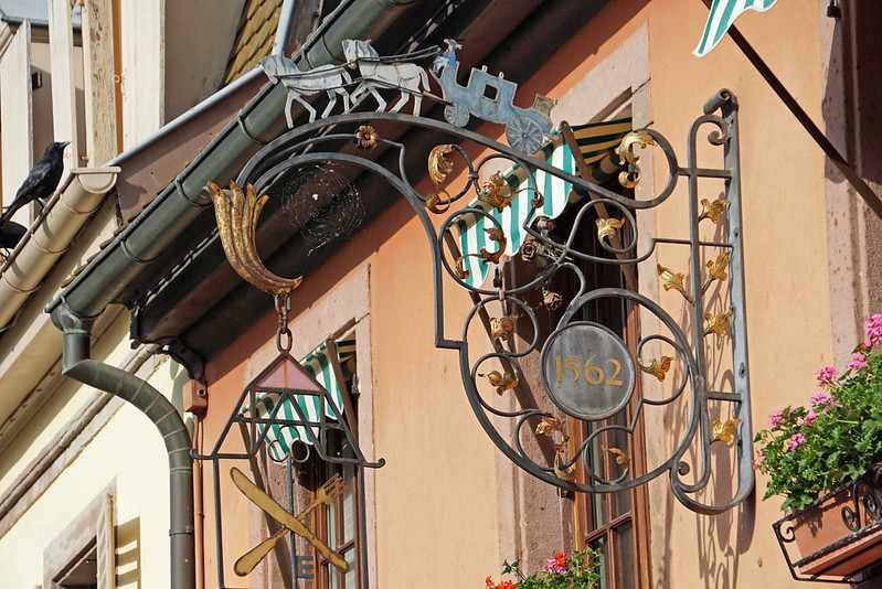 Restaurant sign - Colmar, Alsace<br/>© <a href="https://flickr.com/people/38743501@N08" target="_blank" rel="nofollow">38743501@N08</a> (<a href="https://flickr.com/photo.gne?id=52947594944" target="_blank" rel="nofollow">Flickr</a>)