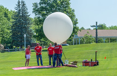 State Farm Enterprise Technology (ET) STEM mentors preparing the high-altitude weather balloon for launch