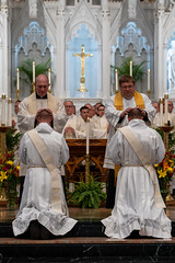 Fr. Chris Singer and Fr. Matt Kujawinski lay hands on the ordinandi.