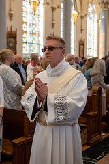 Deacon Cory Pius processes into St. Peter Cathedral.