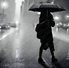 ⁛woman in black, in the rain⁛