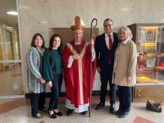 Seminarian Max Kroell and family pose with Bishop Persico on St. Mark Day.