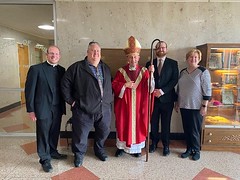 Seminarian Michael Geary and family pose with Bishop Persico and Fr. Jason Feigh on St. Mark Day.