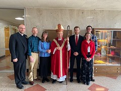 Seminarian Michael Liebler, Fr. Michael LaMarca and family pose with Bishop Persico on St. Mark Day.