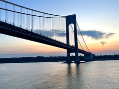 Sailing under the Manhattan Bridge at sunrise