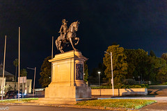 On a clear winter night, the majestic sculpture of King Edward VII glows from street lighting, Sydney, New South Wales, Australia. It is a 1922 bronze statue.