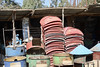 Piles of metal covers & drum-barbeques - Aksum open-air market - Aksum Tigray Ethiopia