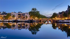 Reflections in the Amsterdam canals during covid lockdown