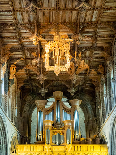 Organ pipes and crucifix in St David's Cathedral - Pembrokeshire, Wales