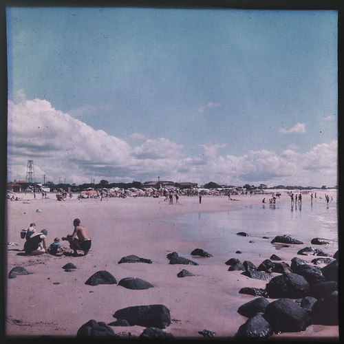 Beachgoers on the beach at Burleigh Heads during the 1940s