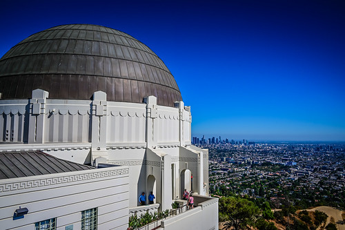 Griffith Observatory dome with view of downtown Los Angeles CA