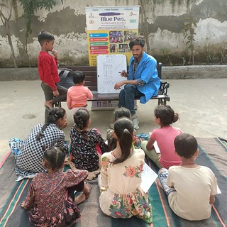 Sourav Sharma, Blue Pen’s Volunteer Coordinator teaching mathematics (LCM) to class 3rd and 4th at okhla phase-1, today 19th Nov, 23