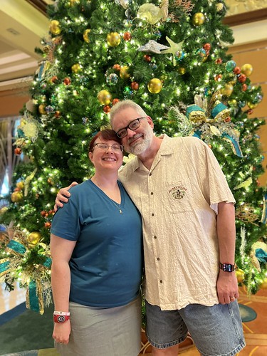 Tracey and Scott in front of the Disney Magic Christmas Tree • <a style="font-size:0.8em;" href="http://www.flickr.com/photos/28558260@N04/53352066722/" target="_blank">View on Flickr</a>