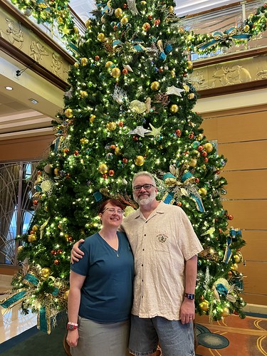 Tracey and Scott in front of the Disney Magic Christmas Tree • <a style="font-size:0.8em;" href="http://www.flickr.com/photos/28558260@N04/53352944371/" target="_blank">View on Flickr</a>