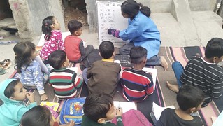 Blue Pen’s Volunteers Rimjhim teaching basic Hindi to class 1st at Sangam Vihar slums, today 26th Nov,23