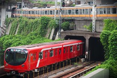 red train, orange train - tokyo
