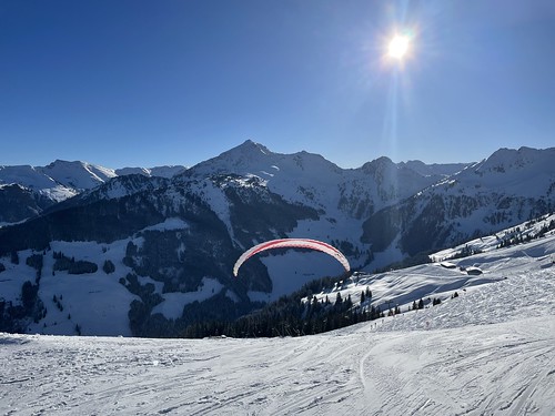 Paraglider taking off from top of Schatzberg