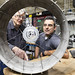 Researchers with 3D printed lunar rover wheel prototype