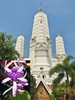 Transworld. Wat Mahathat Worawihan and Petrea volubilis, Purple Wreath, Phetchaburi, Thailand
