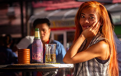 An attractive Thai woman with red hair in Pattaya