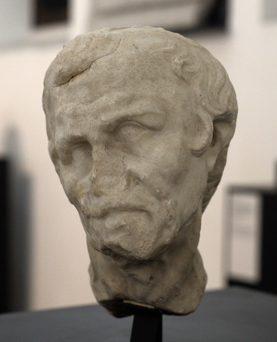 Roman limestone head of a man, possibly a historical figure, from Capua