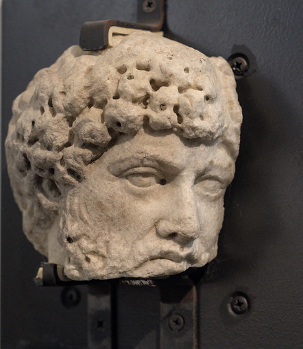 Fragment of a relief from a monument representing a bearded male head (Hadrian?), 2