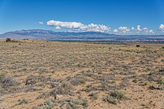 A Wide Angle View Looking Across Petroglyph National Monument and a Backdrop of the Sandia Mountains
