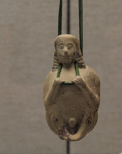 Early Corinthian figure alabastron in the form of a suspended man (satyr?)