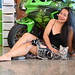 DSC_0777: a woman sitting on the floor next to a cat