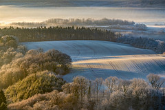 *first sunlight over the frosty valley*