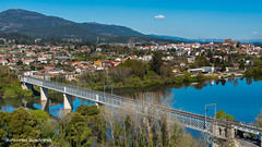 Road and Train Bridge over Minho River and City of Tui in the background.