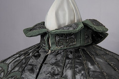 1890s black wool cape accented with dark green - front collar