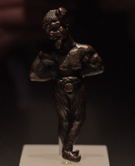 Roman miniature bronze figure of a shackled Germanic prisoner