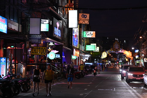 DSC_1547: a busy city street at night with neon signs
