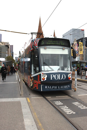D2-class tram #3530 running a Route 5 service to Melbourne University in Polo Ralph Lauren advertising livery at Flinders Street Station tram stop, Melbourne