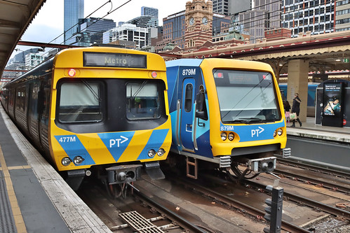 Xtrapolis train bound for Laverton passing faulty Comeng train on Platform 10 Flinders Street Station, Melbourne
