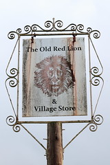 The Old Red Lion pub sign Tetsworth Oxfordshire UK