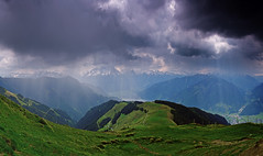 View from the Schwalbenwand towards Zell am See. In the background the High Tauern range