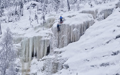 Ice Climbing essentials: axes, ropes, gloves, and crampons