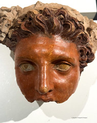 Painted terracotta face of Dionysus (?)
