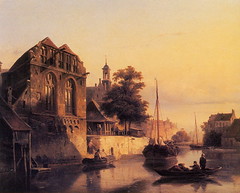 Men in Boats in City Canal