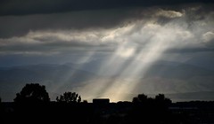 Denver Basin:  Sunbeams Through Storm Clouds at Dusk