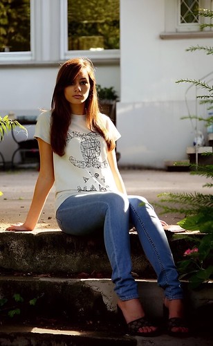 Lady in Jeans and White Shirt