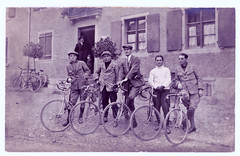 Five cyclists pose