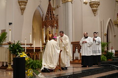 Father Luke offers his first blessing to the bishop.