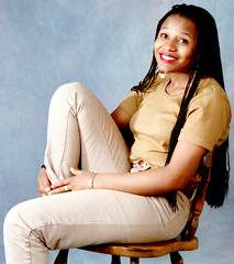 Nomsa Charming South African Model in Beige Jeans & Top Complemented by Her Long Hair Braids Chair Portrait Photoshoot Philly Studio Philadelphia August 1994 007v