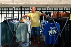 Vendor selling clothes in morning market